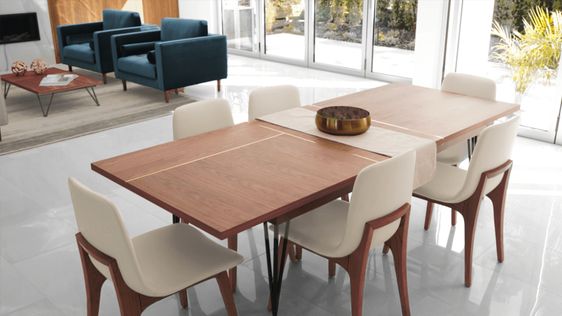 un grand set de cuisine, moderne, avec une grande table en noyer et des chaises confortables en tissu